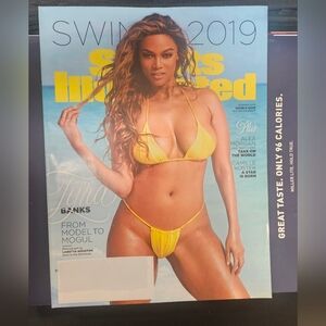 SI Swim 2019 Tyra Banks Yellow Bikini Set